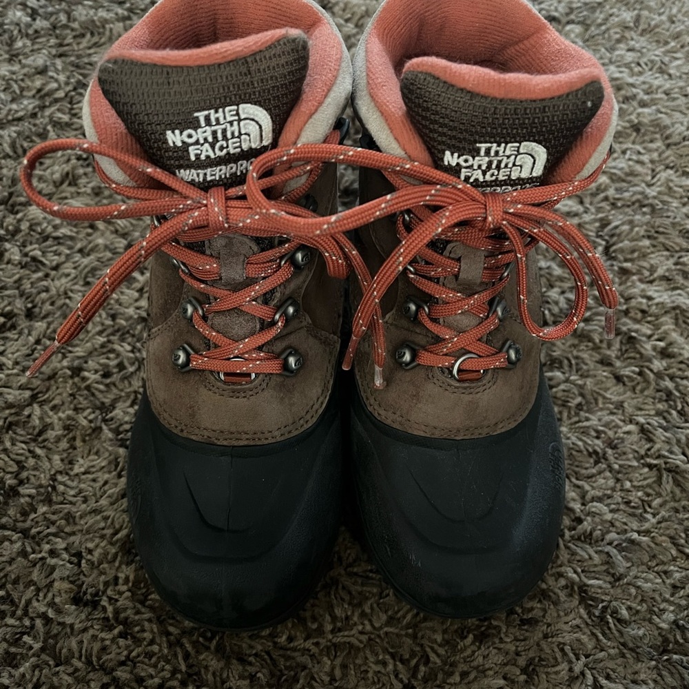 The North Face Kids Brown and Black Boots with Orange Accents